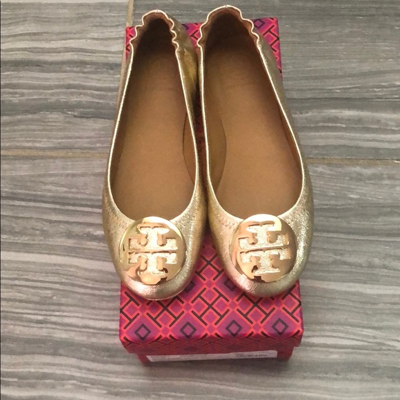 Tory Burch Shoes - Tory Burch gold Minnie travel flats with logo sz 5